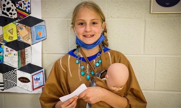 A girl dressed as a historical figure